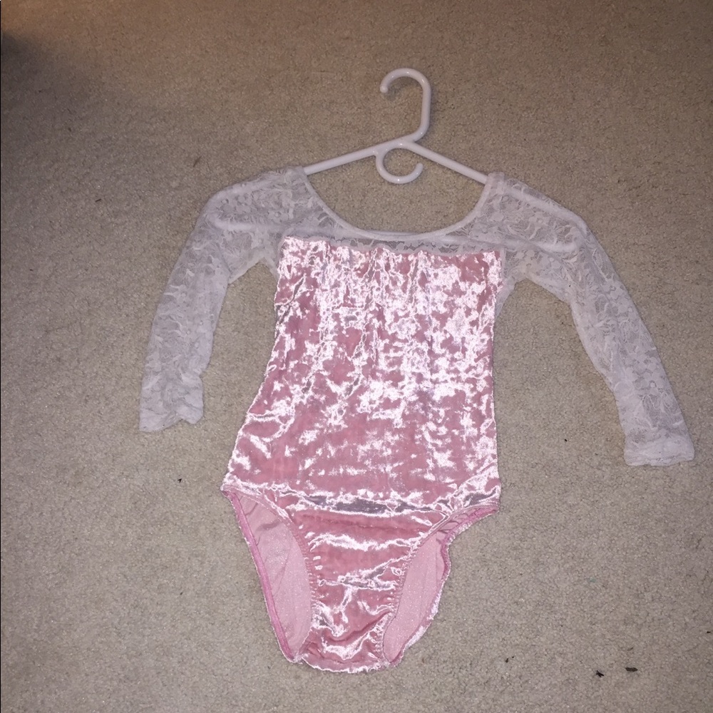 Class In size petite light pink velvet leotard.